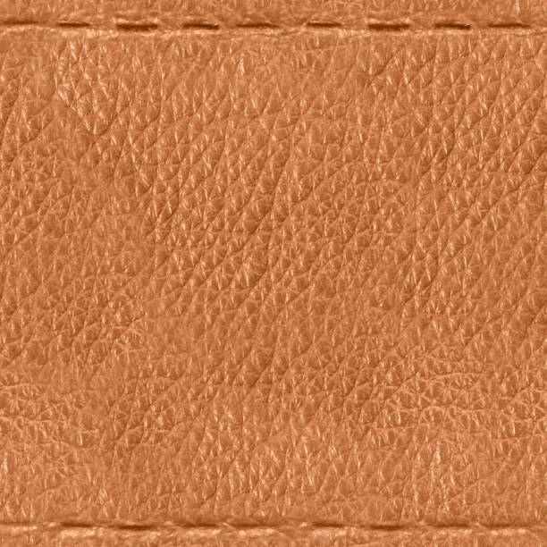 istock Seamless 4k photo texture of light brown leather embossed with stitch line pattern. 2162592497