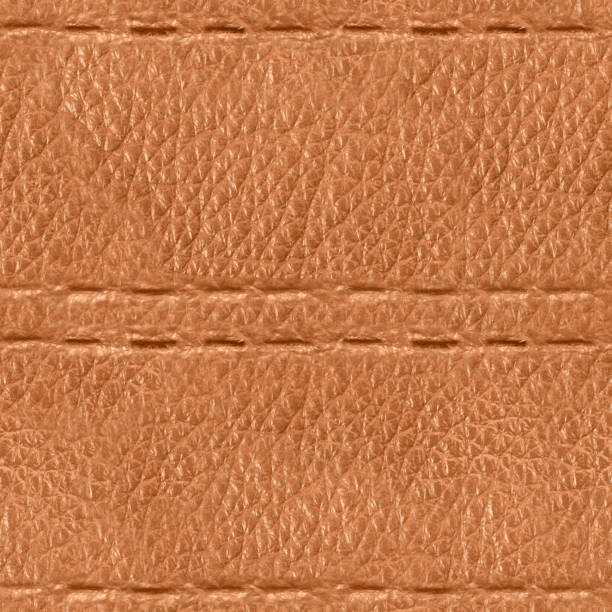 istock Seamless 4k photo texture of light brown leather embossed with stitch line pattern. 2162592500
