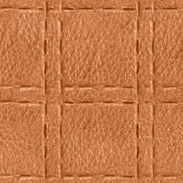 istock Seamless 4k photo texture of light brown leather embossed with stitch line mesh pattern. 2162592508