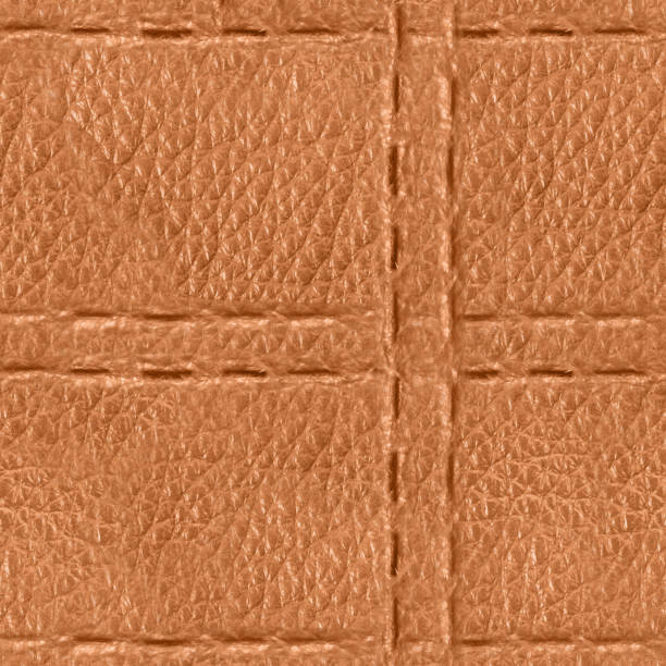 istock Seamless 4k photo texture of light brown leather embossed with stitch line mesh pattern. 2162592514