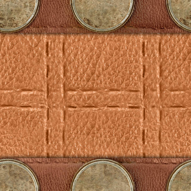 Seamless 4k photo texture of light brown patterned leather surface with brown straps with bronze pendants.