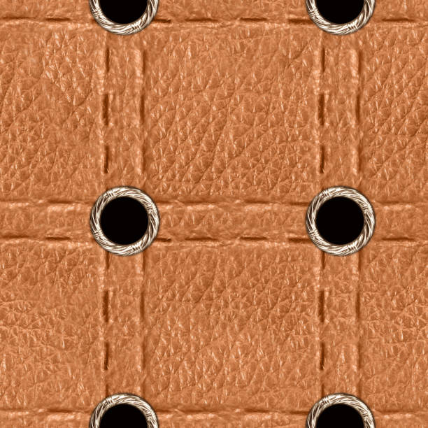 istock Seamless 4k photo texture of light brown leather surface with metal rivets. 2162592976