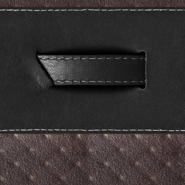 istock Seamless 4k photo armor texture of black and brown leather belt pattern with stitching. 2162593462