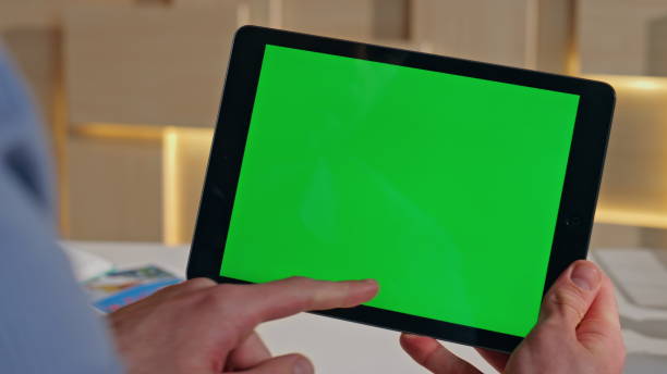 istock Entrepreneur using mockup tablet for online work in home office close up. 2162594541