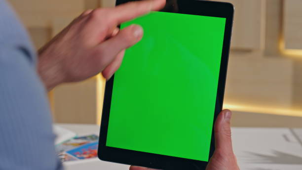istock Office manager using mockup tablet searching information in internet close up. 2162594657