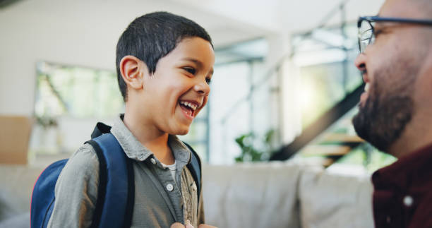 istock Father, boy and son with backpack in living room for preparation, getting ready or back to school. Family, support and happy kid with dad for morning routine, education development or love in home 2162604727