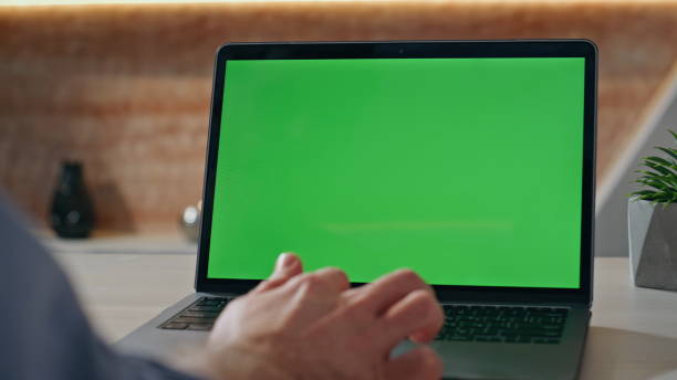 istock Man hands swiping chromakey laptop morning office table closeup. Creator working 2162606061