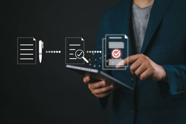 istock Businessman using tablet tick mark on virtual document for online approve paperless quality assurance and ERP management , Prepare check and approve concept. 2162606769
