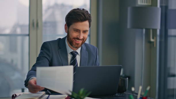istock Creative startuper working laptop luxury workplace closeup. Man looking papers 2162606907