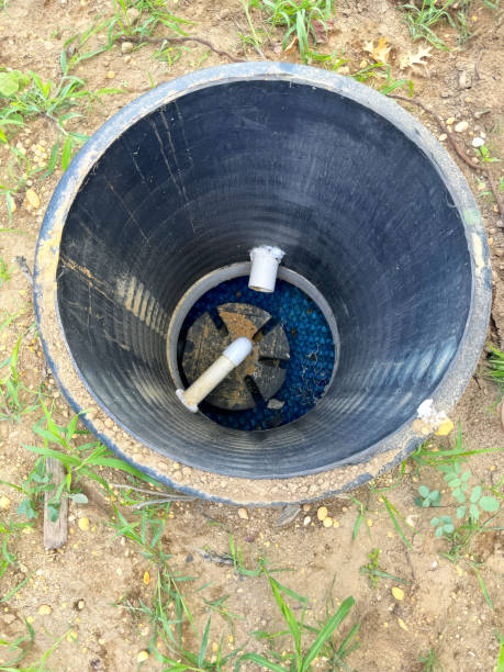 istock Connecting supply pump to a artesian water well 2162606918