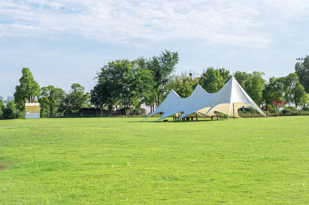 istock Tent on camping grassland in the park 2162609757
