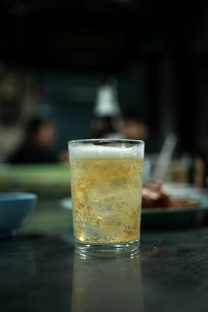 istock Glass of cold beer on table. Close up 2162611834