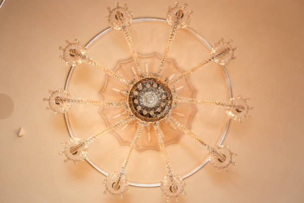 istock Crystal chandelier with golden touchs 2162614976