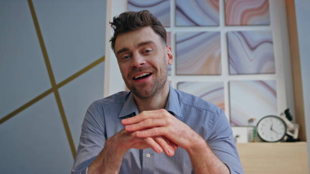 istock Friendly boss chatting online interview at modern interior closeup pov view 2162619136