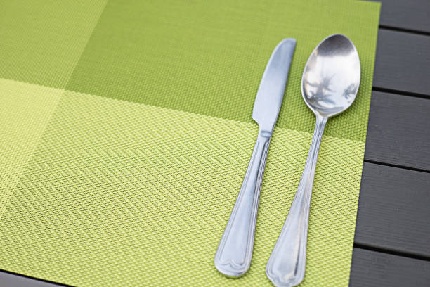 Table arrangement background. Clean shiny metal cutlery.