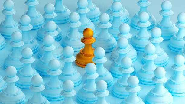istock Golden chess piece among blue chess pieces symbolizing leadership and distinction. 3d rendering. 2162622776