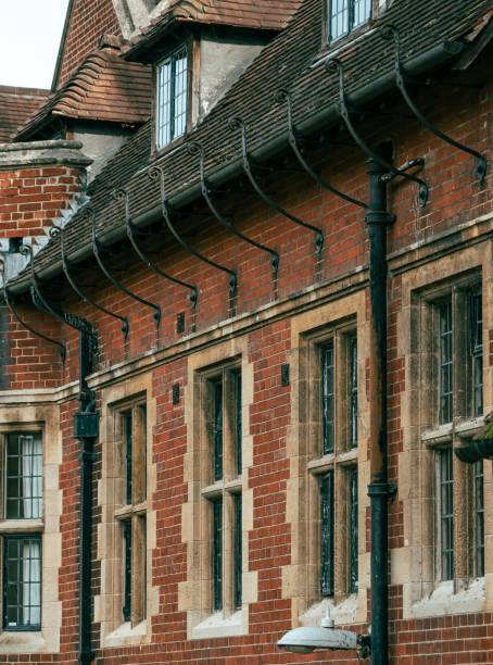 istock A red brick building with ornate ironwork and a row of windows in Cambridge, UK. 2162622801