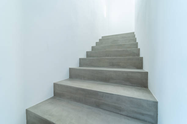 istock Grey minimalistic interior stair in concrete or beton 2162625552