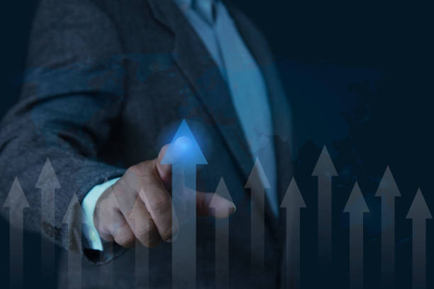 istock Businessman planning growth future in his business on virtual screen. analyzing company financial with digital virtual graphics. Business development, Planning and strategy for business. 2162625592