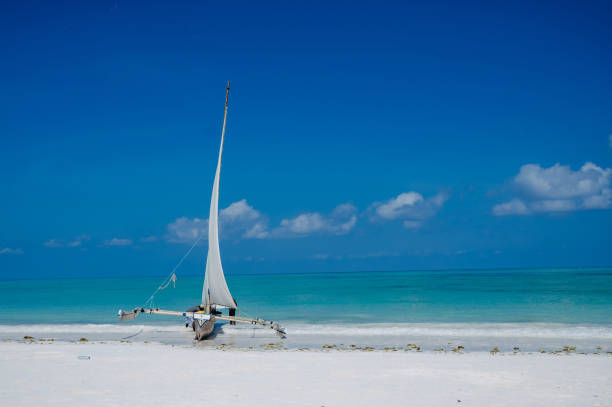 Sailboat in indian ocean on blue sky. Sailboat in Zanzibar