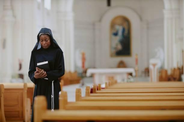istock Young Black Sister In Catholic Church 2162629910