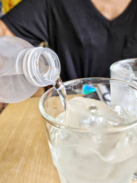 istock Pouring water drink on glass 2162630794
