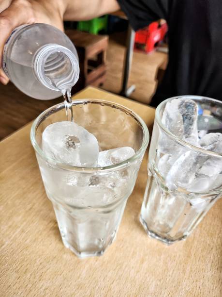 istock Pouring water drink on glass 2162630805