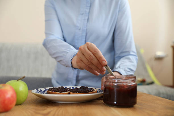 Bake bread with blueberry jam on a charcoal grill