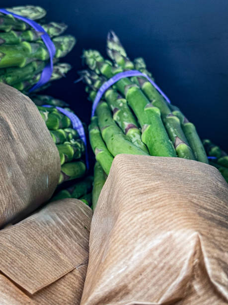 Bunch of asparagus on Package on the shelf
