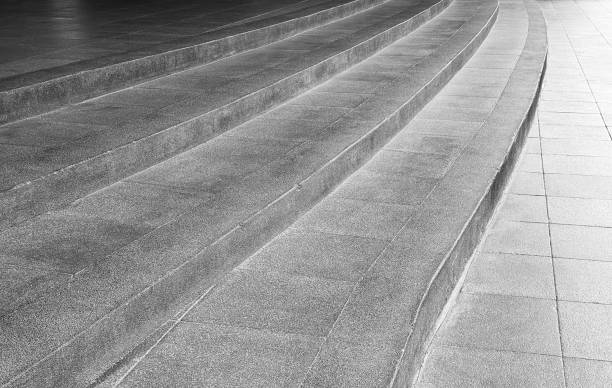 istock Gray curved staircase in front of building 2162639403