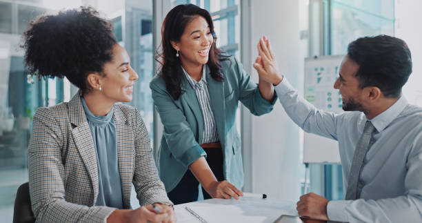 istock Business people, meeting and high five for data analytics, results or statistics in teamwork or collaboration. Analyst with hands together for good news, success and celebration or algorithm solution 2162643083