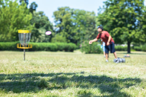 istock Man playing flying disc golf sport game 2162644741