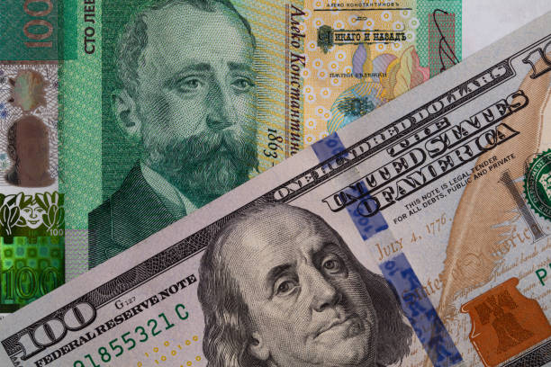 istock Bulgarian lev and US dollar banknotes 2162645892