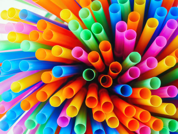 istock Abstract beautiful multicolored drinking straws, macro rainbow circle of tube background 2162646569