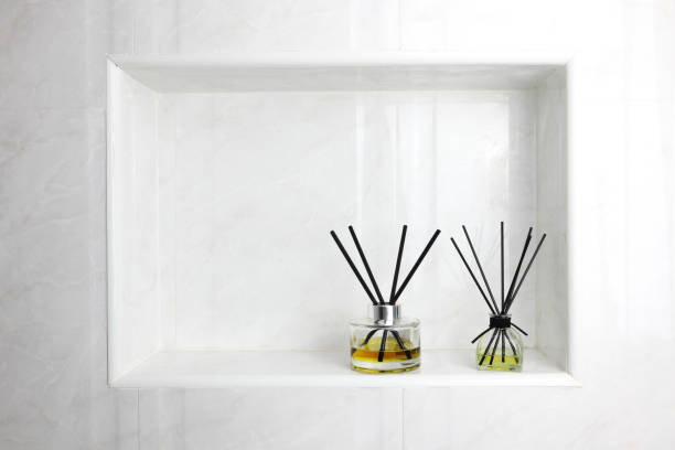 istock luxury aroma reed diffuser bottle on nice white table shelf as room freshener in toilet bathroom 2162648362