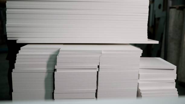 istock Samples of chipboard and MDF panels for furniture production. Selecting material when ordering furniture. Furniture panels are white, in furniture production. 2162649380