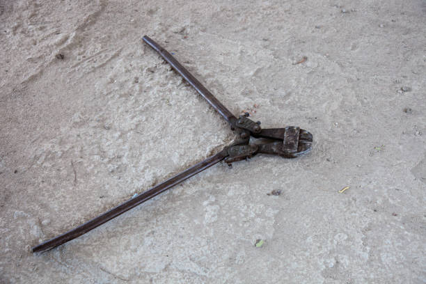 istock A rebar cutter on a construction site floor. 2162650011