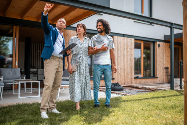 istock Diverse Homebuyers Exploring Property with Agent 2162651050