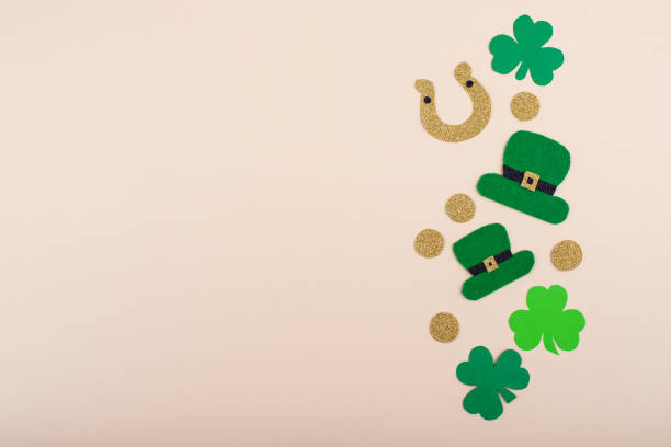 istock St. Patrick's Day concept with leprechaun hat, gold coins and horseshoe 2162651222