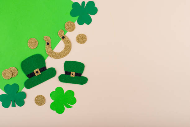 istock St. Patrick's Day concept with leprechaun hat, gold coins and horseshoe 2162651228