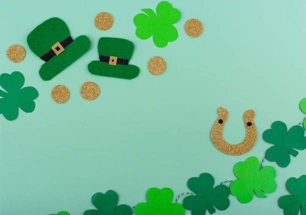 istock St. Patrick's Day concept with leprechaun hat, gold coins and horseshoe 2162651232
