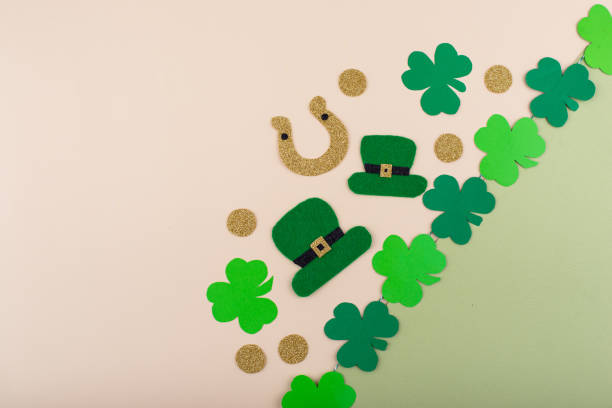 istock St. Patrick's Day concept with leprechaun hat, gold coins and horseshoe 2162651235