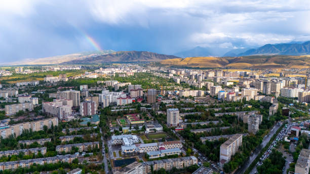 istock Bishkek city panorama with distant rainbow 2162652409