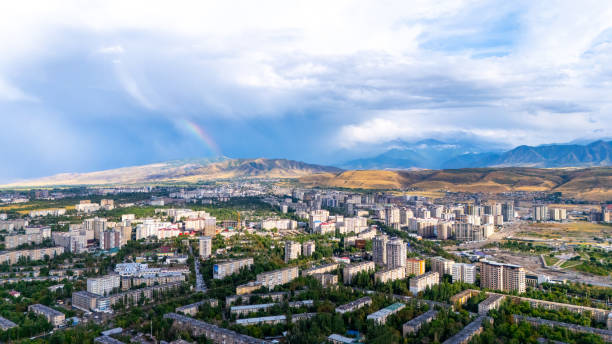 istock Bishkek panorama with rainbow and mountains 2162652616