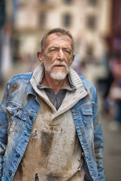 istock Homeless man wandering the streets 2162655079