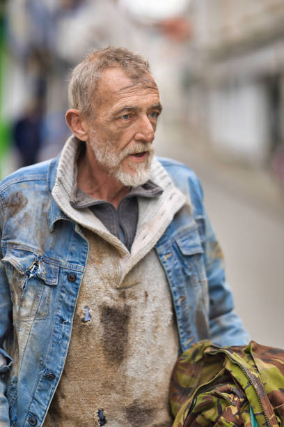 istock Homeless man wandering the streets 2162655114