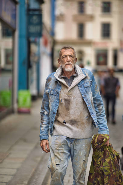 istock Homeless man wandering the streets 2162655389