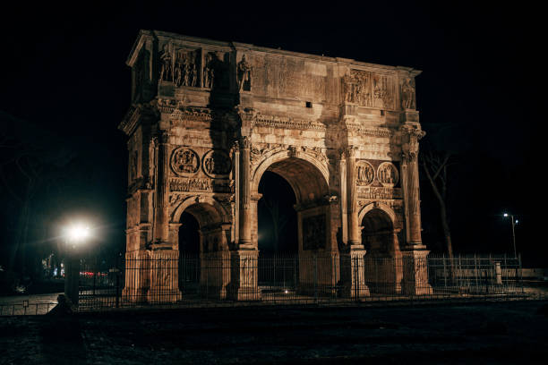 Arch of Galerius seen from below, famous historic landmark and monument with sculptural relief in early Byzantie art, city center of Thessaloniki, Greece, blue sky, copy space