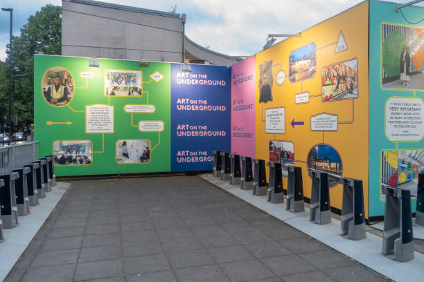 Display promoting Public Transportation's 'Art on the Underground' contemporary art programme, behind Southwark Underground Station, London, England. The display features the context for some historical projects.