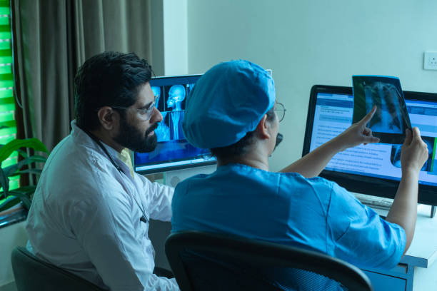 istock Doctors analyzing medical x-ray in hospital 2162656257